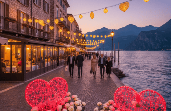 Romantic illuminated promenade at Lake Garda during Lago di Garda in Love Valentine's festival with couples strolling